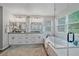 Well-lit bathroom featuring double vanity and soaking tub at 5746 Aspen Creek Dr, Broomfield, CO 80020
