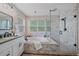 Tastefully designed bathroom featuring double vanity, soaking tub and glass shower at 5746 Aspen Creek Dr, Broomfield, CO 80020