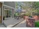 Charming outdoor patio with a dining table and a brick outdoor cooking station at 5746 Aspen Creek Dr, Broomfield, CO 80020