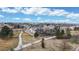 Aerial view showcases the single-Gathering home situated among landscaped yards in the community at 16500 Crosby Dr, Broomfield, CO 80023