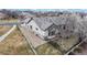 Aerial view of a single Gathering house, showing the roof, fenced in yard and proximity to neighbors at 16500 Crosby Dr, Broomfield, CO 80023