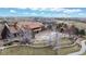 An aerial view of the community clubhouse, pool and manicured grounds at 16500 Crosby Dr, Broomfield, CO 80023