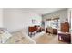 Guest bedroom with a daybed, desk, and large window offering plenty of light at 16500 Crosby Dr, Broomfield, CO 80023
