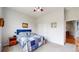 Comfortable guest bedroom with a large window, closet, and closet space at 16500 Crosby Dr, Broomfield, CO 80023