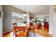 Bright breakfast nook featuring a round table and chairs, with an eat-in kitchen nearby at 16500 Crosby Dr, Broomfield, CO 80023