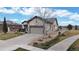 Charming single-Gathering home featuring a well-manicured lawn and an attached two-car garage at 16500 Crosby Dr, Broomfield, CO 80023