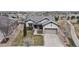 Well-maintained single-Gathering home with a two-car garage and manicured front lawn at 16500 Crosby Dr, Broomfield, CO 80023