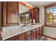 Bathroom with double vanity and an expansive view of a wooded vista at 168 Corkscrew Dr, Breckenridge, CO 80424