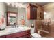 Bathroom showcasing a granite countertop vanity and glass enclosed shower with tile surround at 168 Corkscrew Dr, Breckenridge, CO 80424