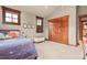 A charming bedroom with natural light, wooden trim, and cozy atmosphere at 168 Corkscrew Dr, Breckenridge, CO 80424