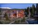Stunning mountain home with stone accents, mature trees, and mountain views at 168 Corkscrew Dr, Breckenridge, CO 80424