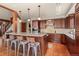 Spacious kitchen with granite countertops, a large island, and hardwood floors at 168 Corkscrew Dr, Breckenridge, CO 80424