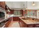 Gourmet kitchen with custom cabinets, granite countertops, and stainless appliances at 168 Corkscrew Dr, Breckenridge, CO 80424