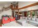 Open-concept living area with stairs and hardwood floors at 168 Corkscrew Dr, Breckenridge, CO 80424