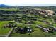 Aerial view showing a large estate with surrounding green space at 12768 Grizzly Dr, Littleton, CO 80127