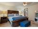 Spacious bedroom with a king-size bed and ensuite bathroom at 12768 Grizzly Dr, Littleton, CO 80127