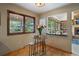 Charming breakfast nook with a view of the backyard and plenty of natural light at 12768 Grizzly Dr, Littleton, CO 80127