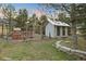 Chicken coop and run with storage shed in backyard at 12768 Grizzly Dr, Littleton, CO 80127