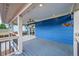Large covered deck with a ceiling fan and outdoor space at 1922 Danube Way, Aurora, CO 80011