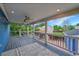 Spacious covered back deck for entertaining and relaxing outdoors at 1922 Danube Way, Aurora, CO 80011