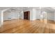 Expansive attic space featuring hardwood floors, multiple doors, and ample natural light at 963 N Lafayette St, Denver, CO 80218