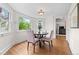 Cozy breakfast nook featuring ample natural light and hardwood floors at 963 N Lafayette St, Denver, CO 80218