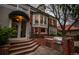 Charming brick patio area featuring an outdoor kitchen and easy access to the house through an elegant glass door at 963 N Lafayette St, Denver, CO 80218