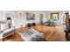Open-concept living room with hardwood floors and stylish decor at 963 N Lafayette St, Denver, CO 80218