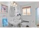 Cozy bathroom with large sink, tile flooring, and classic finishes at 816 Forest St, Denver, CO 80220