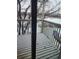 Balcony with a view of snowy trees at 1304 S Parker Rd # 359, Denver, CO 80231