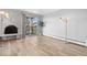 Living room features brick fireplace and access to outdoor balcony at 1304 S Parker Rd # 359, Denver, CO 80231