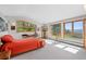 Bedroom featuring large windows with great views, a bed and furniture at 857 Pawnee Trl, Castle Rock, CO 80108