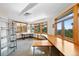 Spacious bonus room with built-in desks and shelving, perfect for a home office at 857 Pawnee Trl, Castle Rock, CO 80108