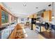 Bright kitchen with granite countertops and stainless steel appliances at 857 Pawnee Trl, Castle Rock, CO 80108