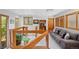 A cozy living room with comfortable gray sofa and open staircase with glass inserts at 857 Pawnee Trl, Castle Rock, CO 80108