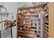 Wine cellar with wooden shelves filled with an array of wine bottles and accessories at 857 Pawnee Trl, Castle Rock, CO 80108