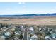 Panoramic aerial view of neighborhood with mountains in the distance at 11256 W 104Th Ave, Broomfield, CO 80021