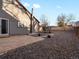 Backyard featuring a patio area, rock garden, and a privacy fence at 11256 W 104Th Ave, Broomfield, CO 80021