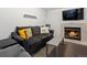 Finished basement with a fireplace, seating, and room to spread out at 11256 W 104Th Ave, Broomfield, CO 80021