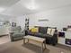 Finished basement with a seating area, laundry machines, and more at 11256 W 104Th Ave, Broomfield, CO 80021