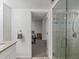 Bathroom showcasing a glass-enclosed shower and a granite vanity at 11256 W 104Th Ave, Broomfield, CO 80021