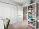 Spacious closet with sliding doors near a bookcase, offering ample storage at 11256 W 104Th Ave, Broomfield, CO 80021
