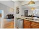 Modern kitchen with stainless steel appliances, granite countertops, and wooden cabinetry at 11256 W 104Th Ave, Broomfield, CO 80021