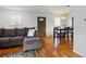 Inviting living room with hardwood floors, comfortable sofa, and lots of natural light at 11256 W 104Th Ave, Broomfield, CO 80021