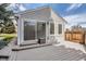 Charming home back deck with sliding glass door and a view to the green backyard at 7946 S Pennsylvania Ct, Littleton, CO 80122