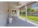 Covered patio overlooking a beautifully landscaped backyard and mature trees at 7946 S Pennsylvania Ct, Littleton, CO 80122