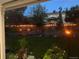 Outdoor space featuring a well-maintained lawn, string lights, and tasteful landscaping at 7946 S Pennsylvania Ct, Littleton, CO 80122