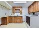 Basement laundry room features a utility sink, cabinets, countertop space, and a modern washer and dryer at 7946 S Pennsylvania Ct, Littleton, CO 80122