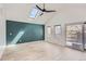 Sunroom with vaulted ceilings, a ceiling fan, and a sliding glass door to the outside at 7946 S Pennsylvania Ct, Littleton, CO 80122