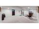 Expansive basement with versatile spaces, ideal for a game room or lounge area with modern finishes at 3064 S Holly Pl, Denver, CO 80222